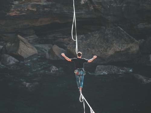 A man walking on a line