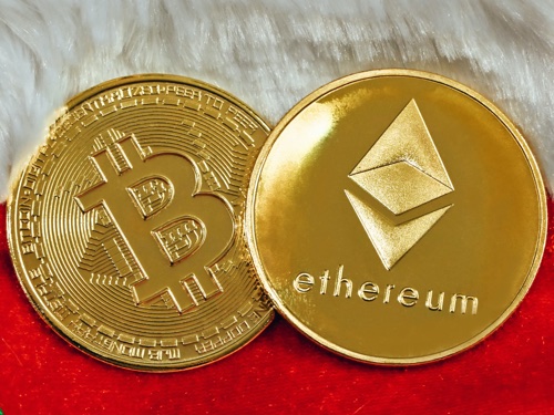 Two coins, one Bitcoin and one Ethereum
